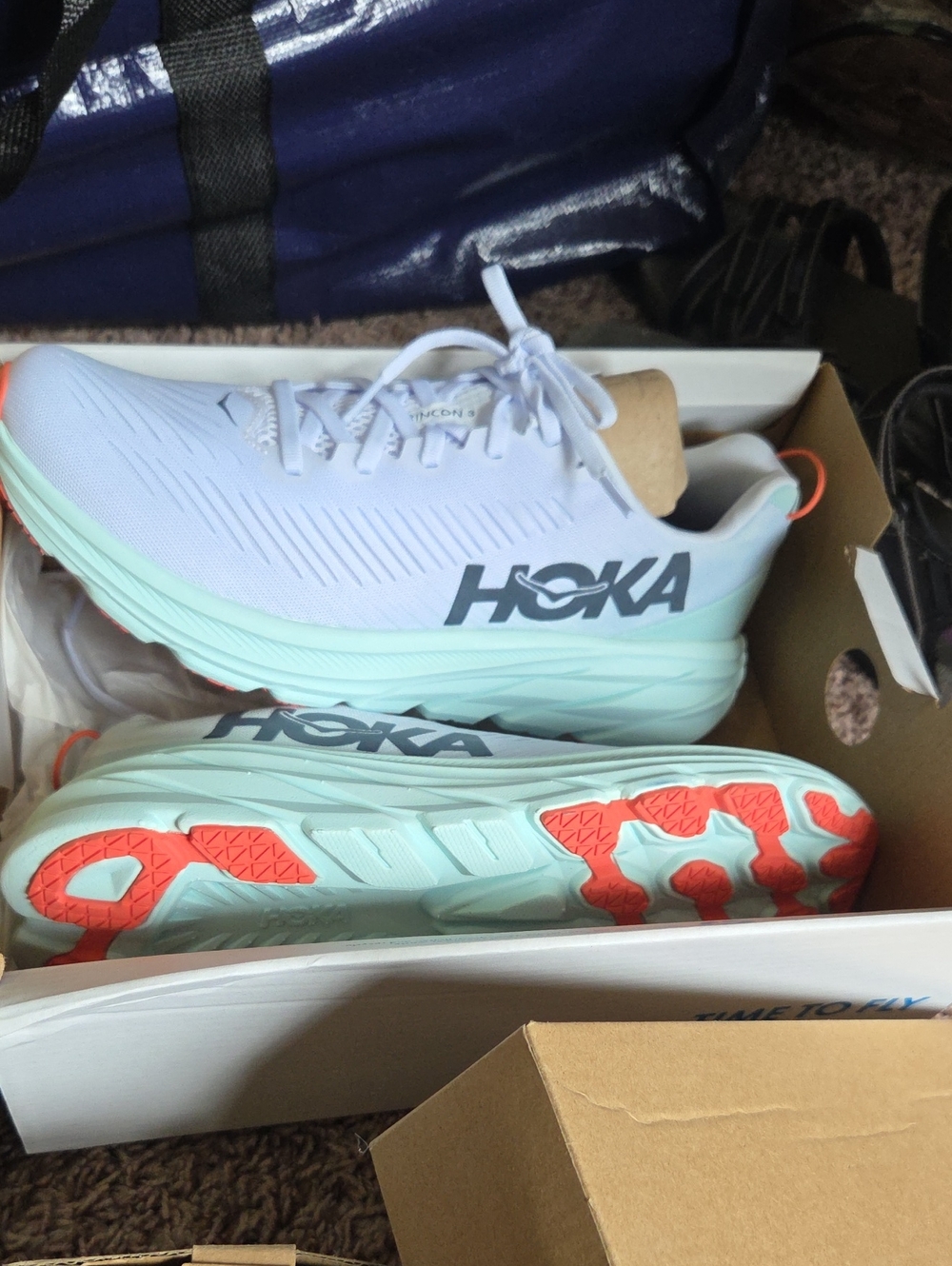 Hoka Women's Light Blue and Coral Road Running Shoes